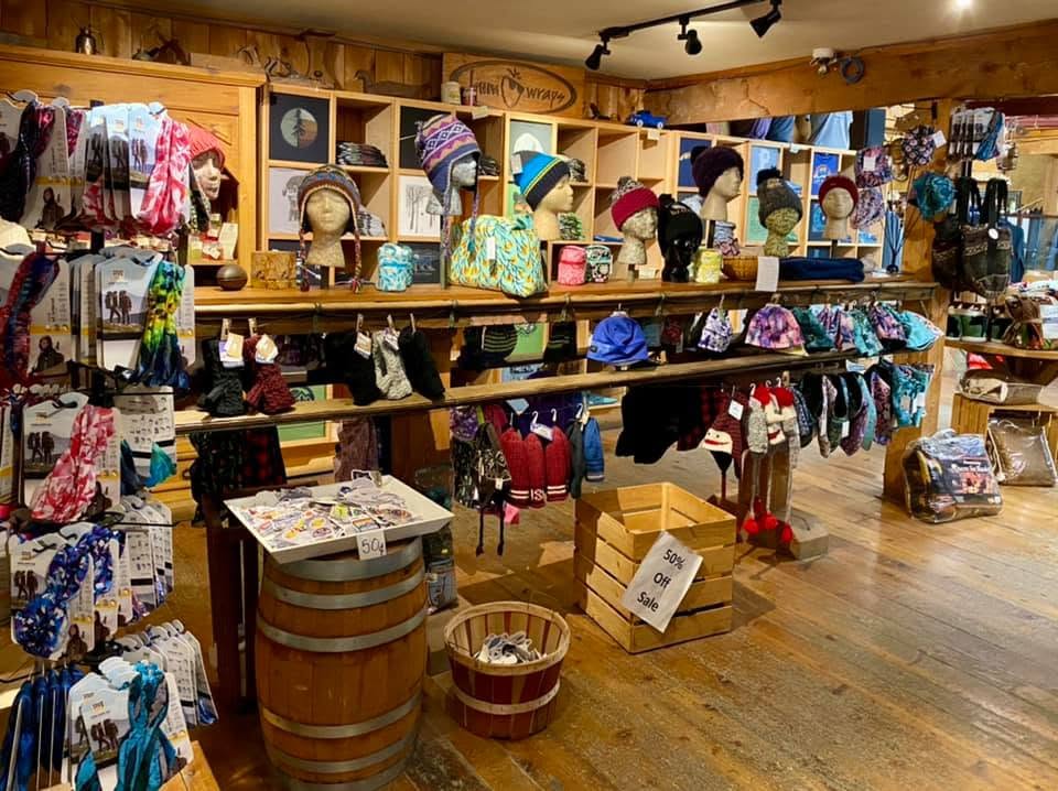 Hats, mittens, and accessories displayed inside Jay Country Store